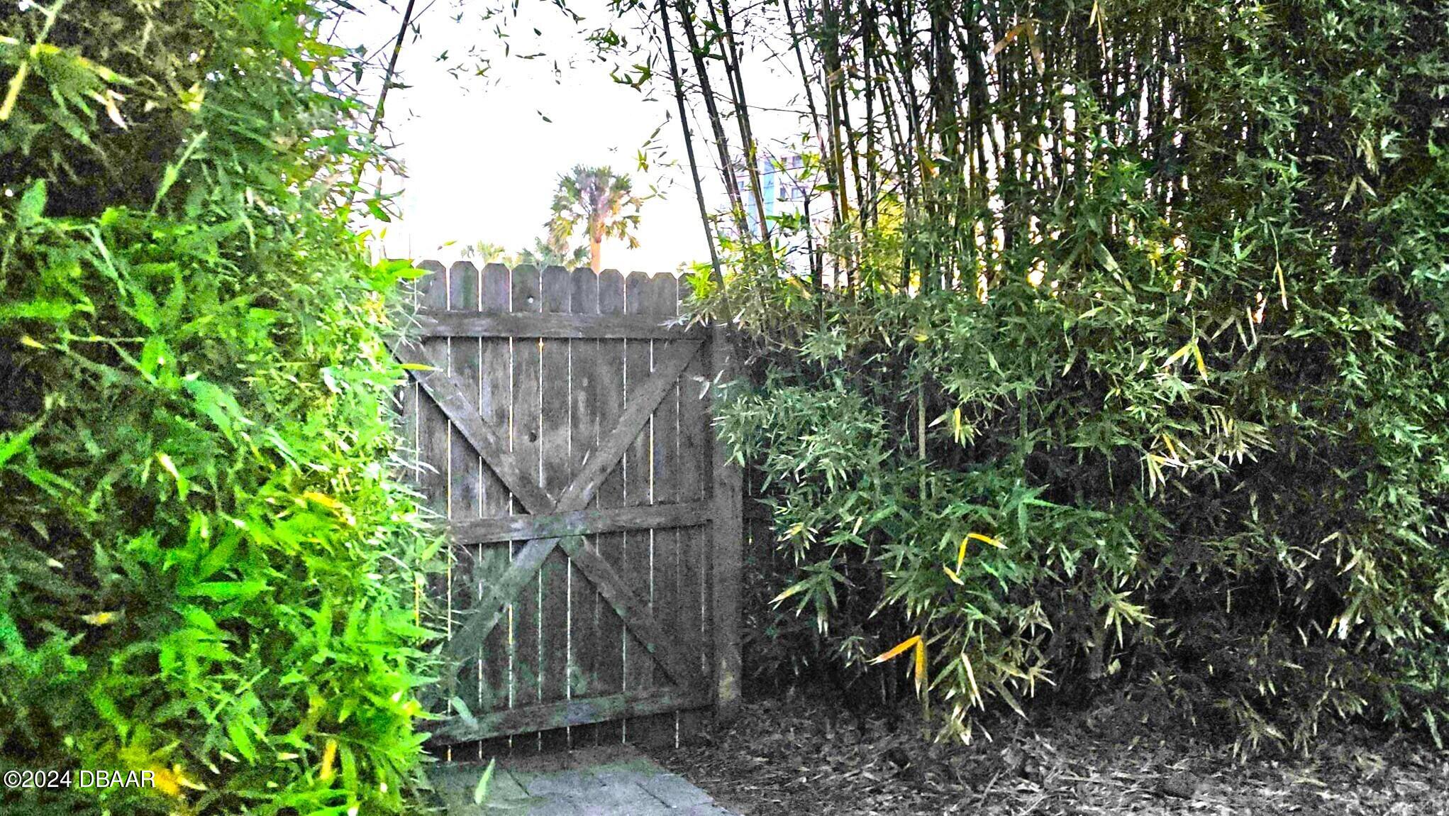 5 Essex Drive Ormond Beach, FL 32176 - Photo 40 of 51 Back yard gate