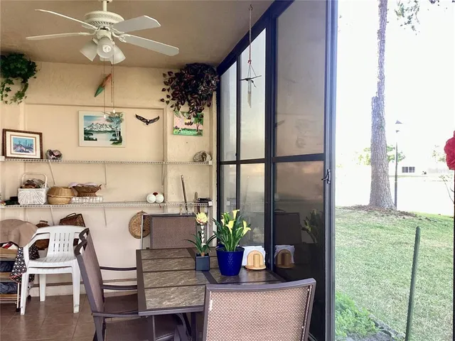 a kitchen with a table chairs dining table and chairs