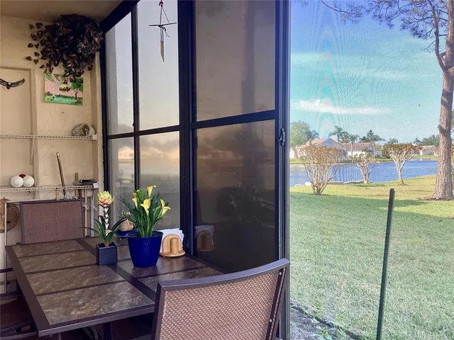 a view of balcony with a potted plant