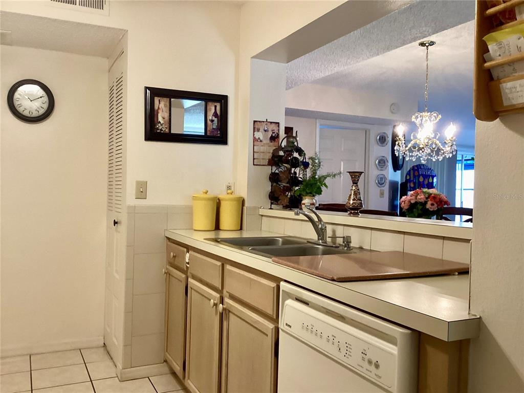 4529 Whitton Way, Unit 214 New Port Richey, FL 34653 - Photo 5 of 45 a bathroom with a sink and a mirror