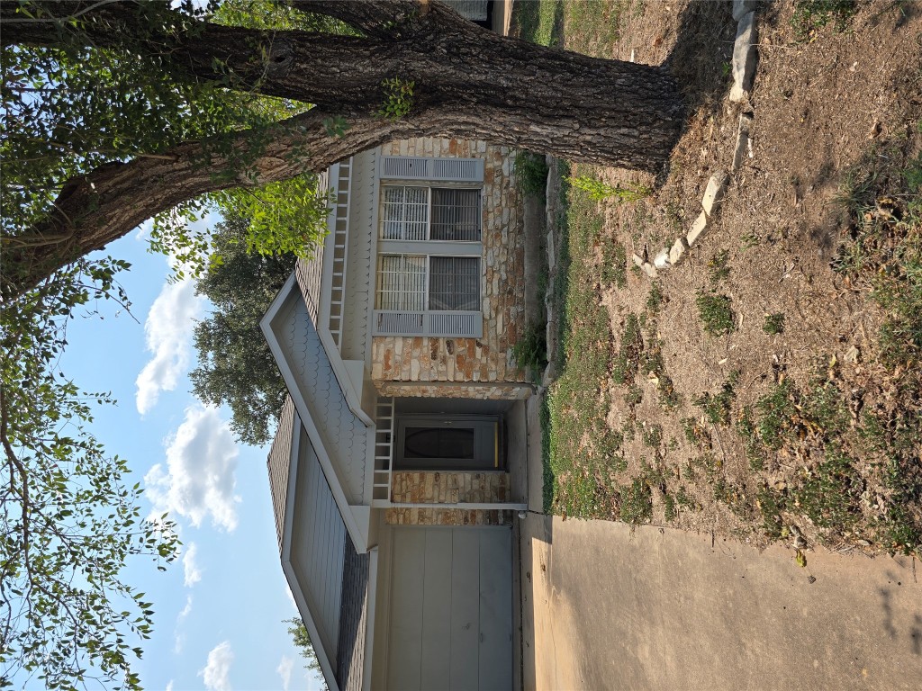 16922 Whitebrush Loop Austin, TX 78717 - Photo 1 of 10 front view of a house with a large tree