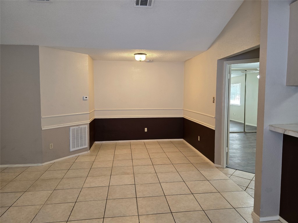 16922 Whitebrush Loop Austin, TX 78717 - Photo 5 of 10 a view of an empty room and window