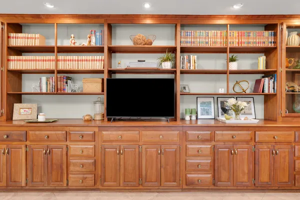 a kitchen with stainless steel appliances granite countertop a stove sink and cabinets