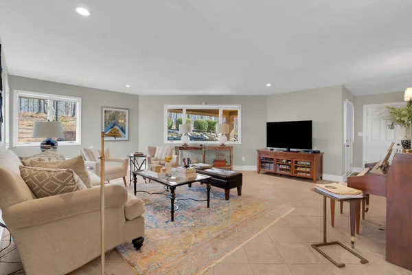 a kitchen with granite countertop stainless steel appliances sink and cabinets