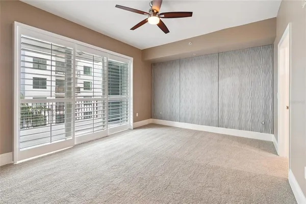 a view of an empty room and window