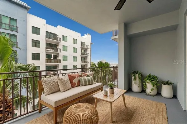 a view of a brick building with many windows