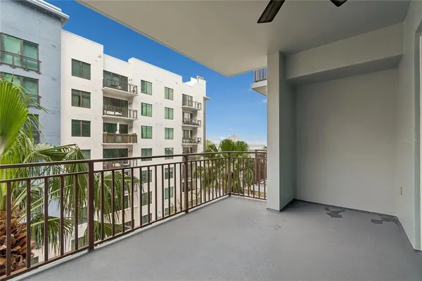 a view of swimming pool with outdoor seating