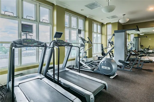 a picture of a bathroom with a shower and a mirror