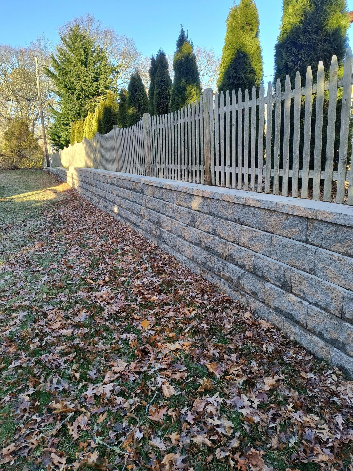 239 Paddocks Path Dennis, MA 02638 - Photo 4 of 26 100 ft. retaining wall