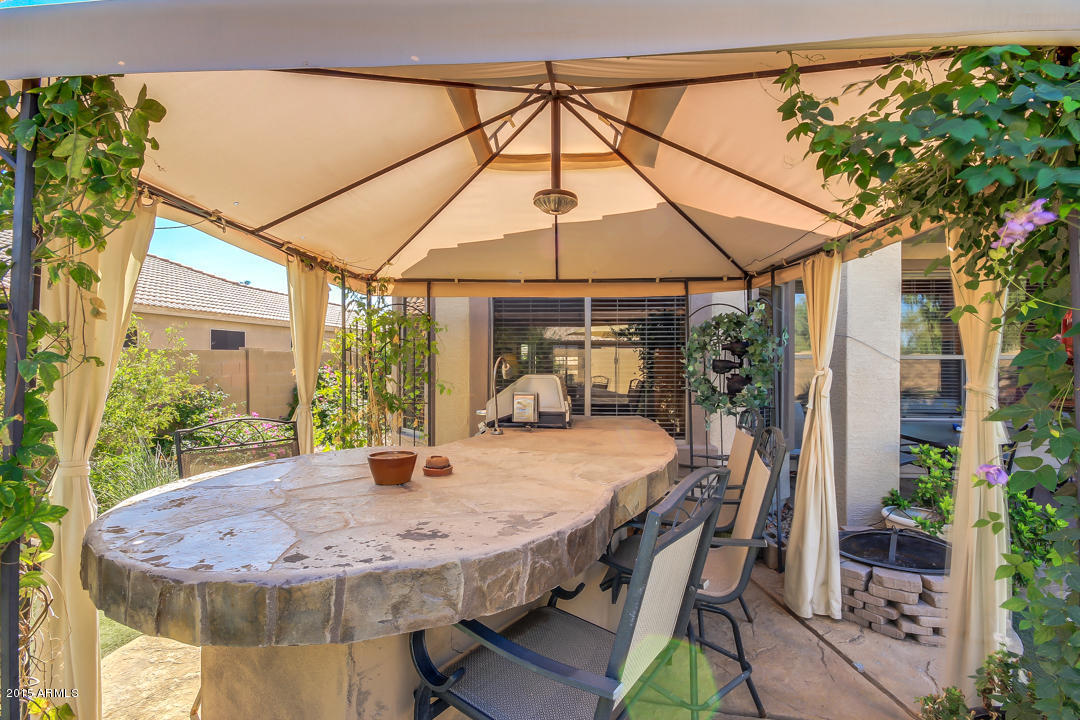 3288 East Warbler Road Gilbert, AZ 85297 - Photo 36 of 45 OutdoorKitchenBarFirePit