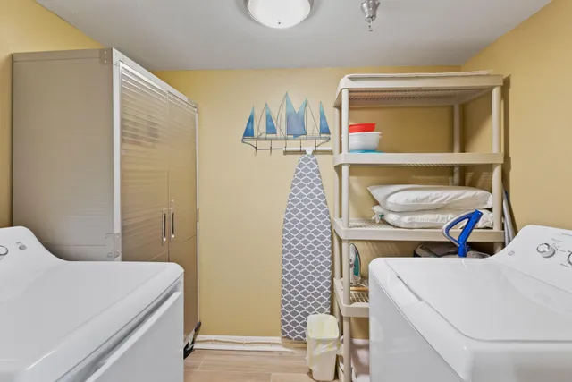 a bathroom with a sink toilet and vanity
