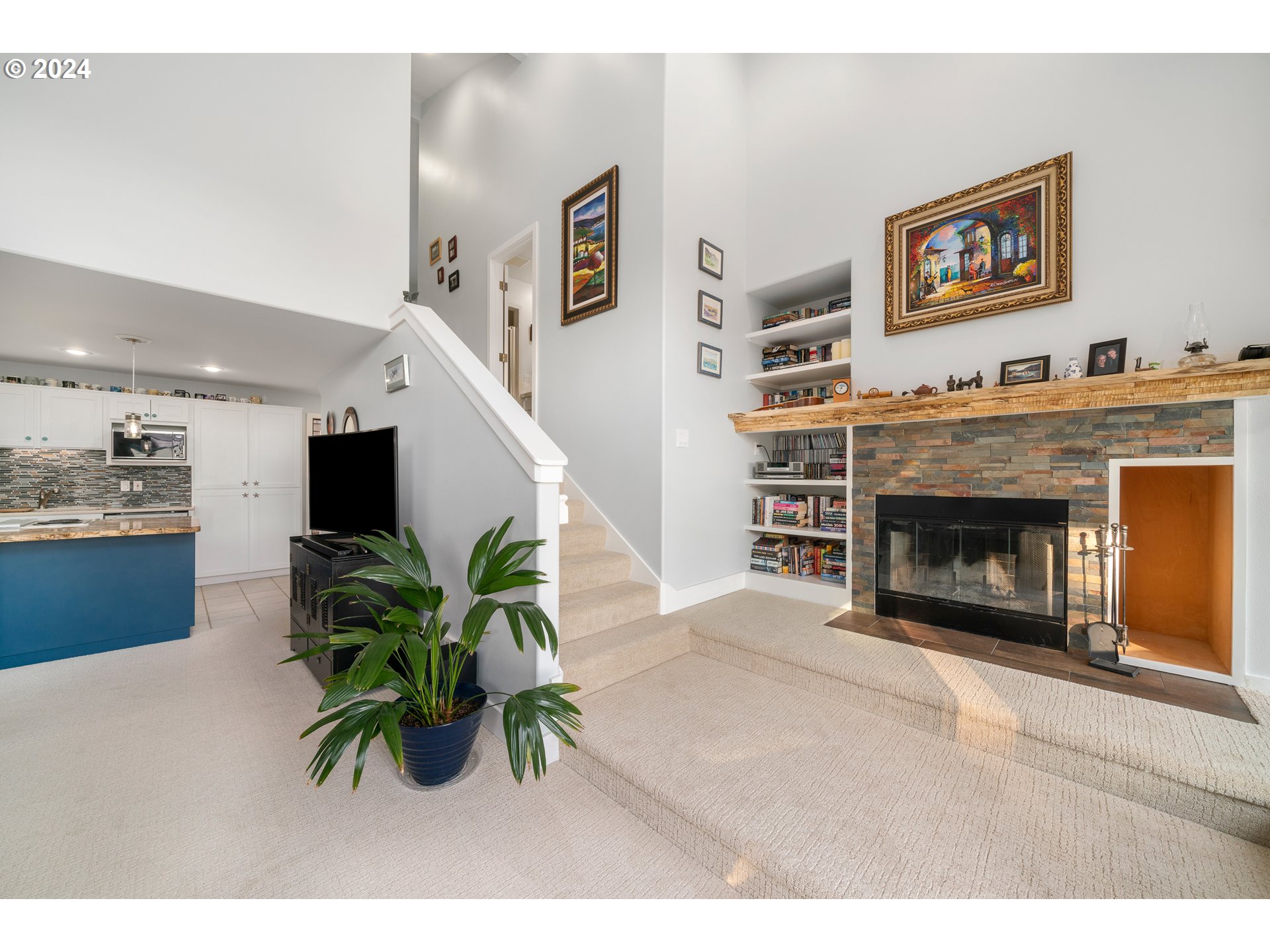 505 Capes Drive, Unit 5 Oceanside, OR 97141 - Photo 18 of 37 a living room with furniture and a fireplace