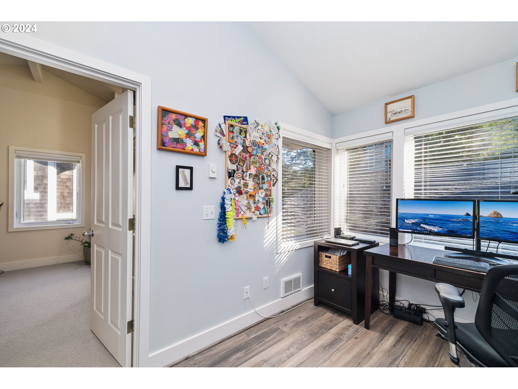 505 Capes Drive, Unit 5 Oceanside, OR 97141 - Photo 22 of 37 a view of a workspace with furniture and a window