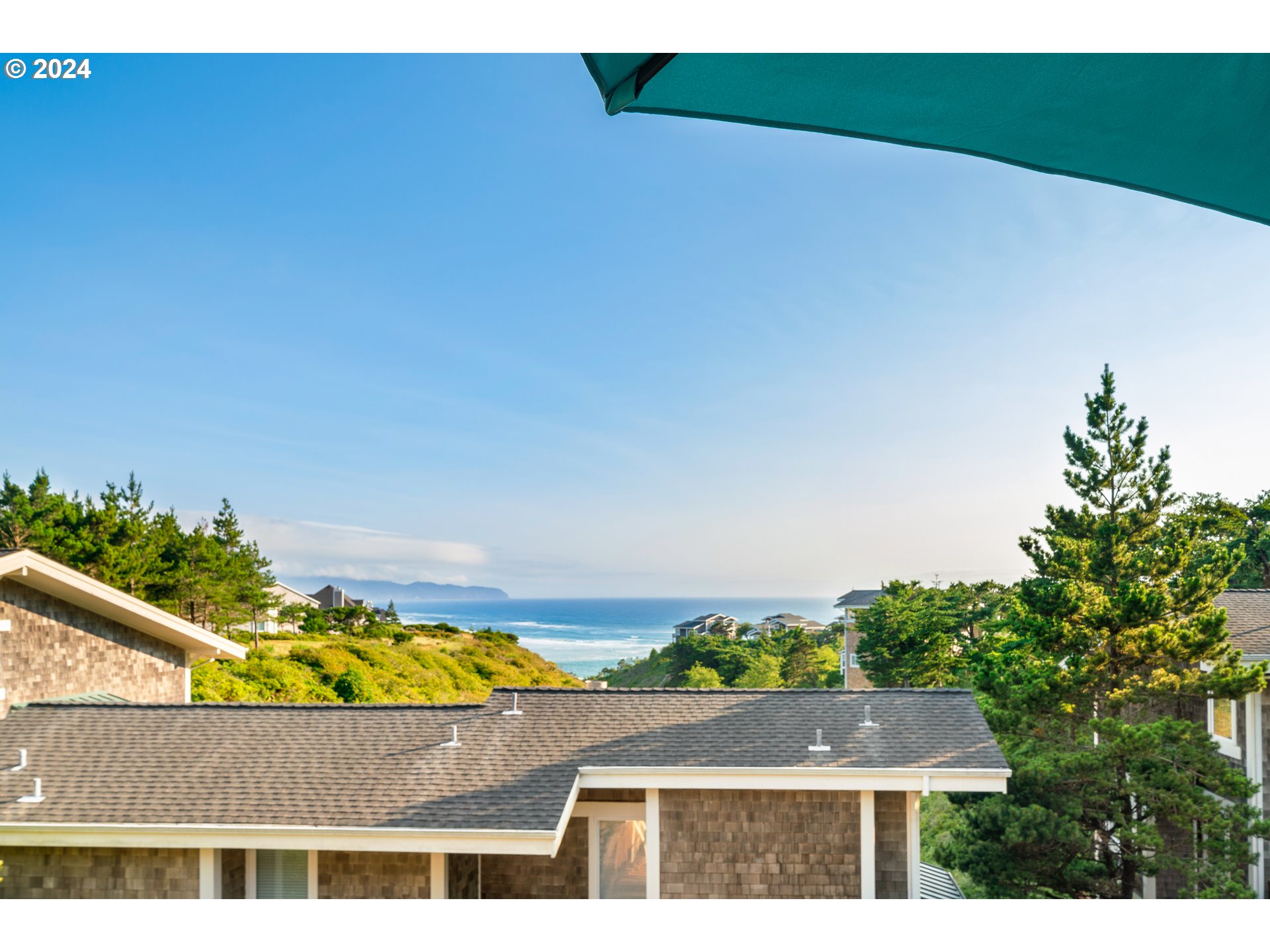 505 Capes Drive, Unit 5 Oceanside, OR 97141 - Photo 29 of 37 a view of an swimming pool and outdoor space