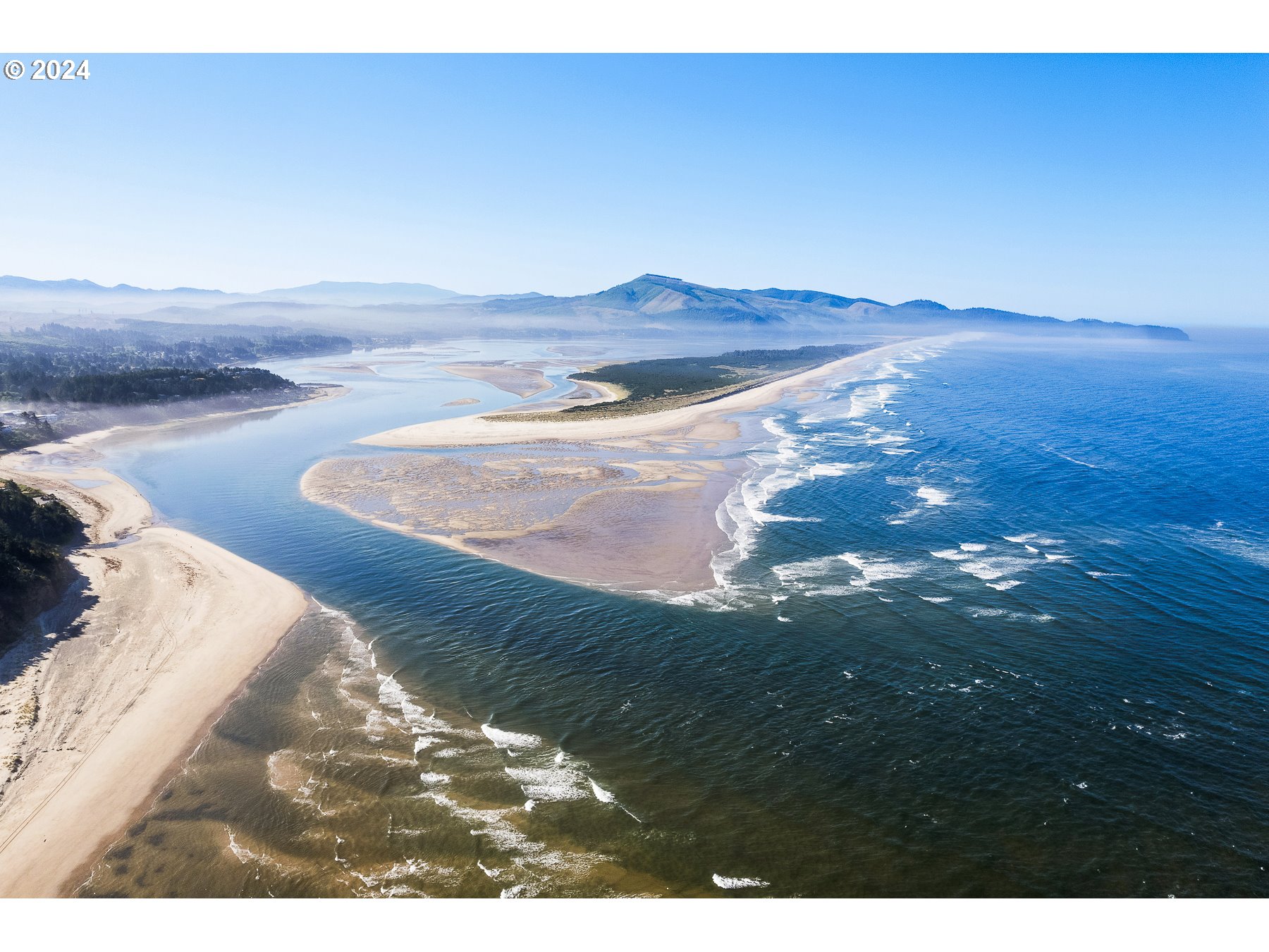 505 Capes Drive, Unit 5 Oceanside, OR 97141 - Photo 35 of 37 a view of a wooden floor