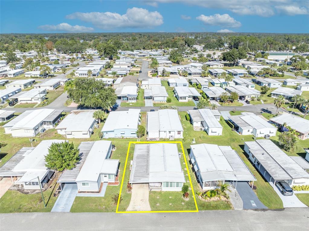 223 Paradise Leesburg, FL 34788 - Photo 26 of 43 an aerial view of residential houses with outdoor space