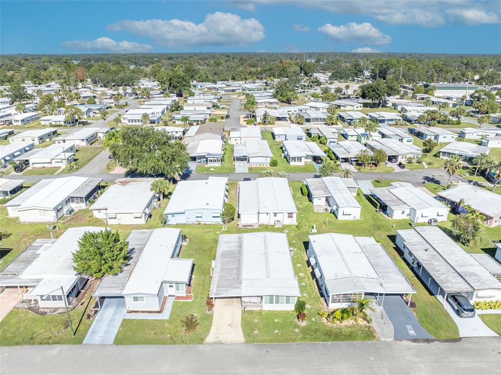223 Paradise Leesburg, FL 34788 - Photo 27 of 43 an aerial view of residential houses with outdoor space
