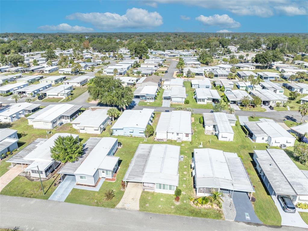 223 Paradise Leesburg, FL 34788 - Photo 28 of 43 an aerial view of residential houses with outdoor space