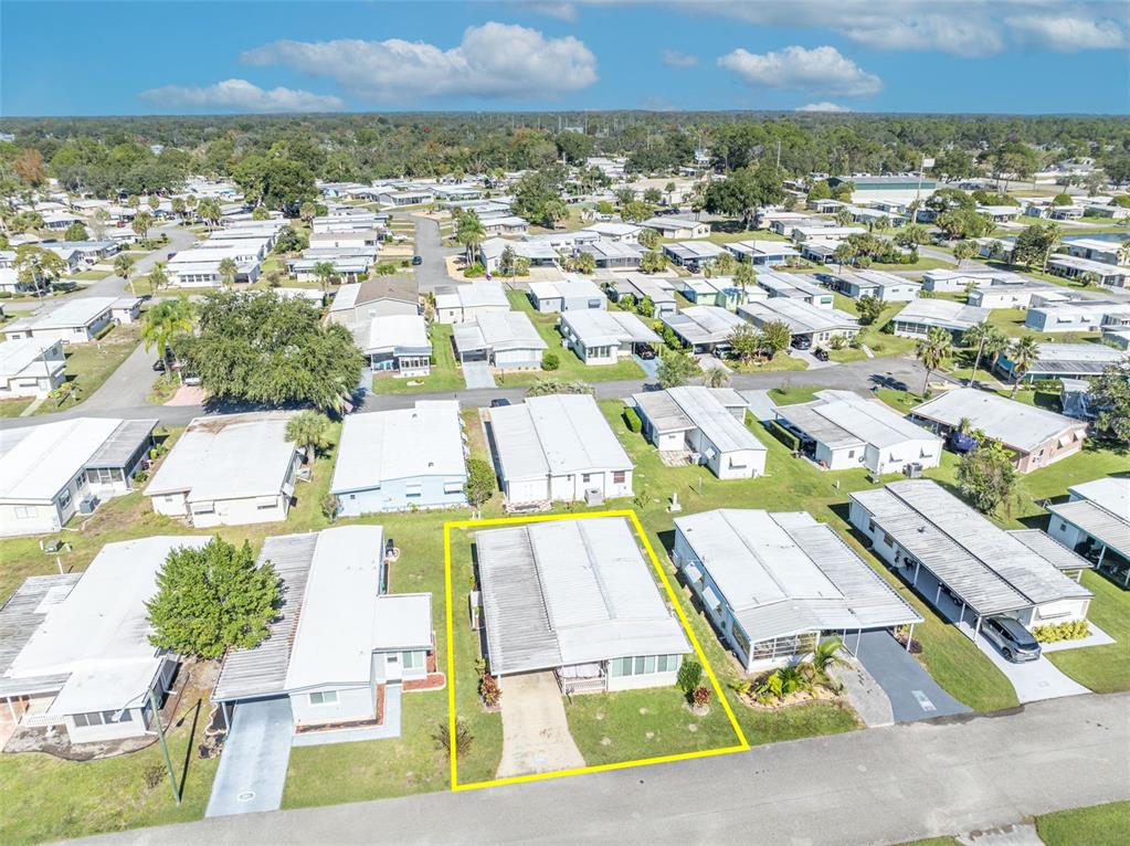 223 Paradise Leesburg, FL 34788 - Photo 30 of 43 an aerial view of residential houses with outdoor space