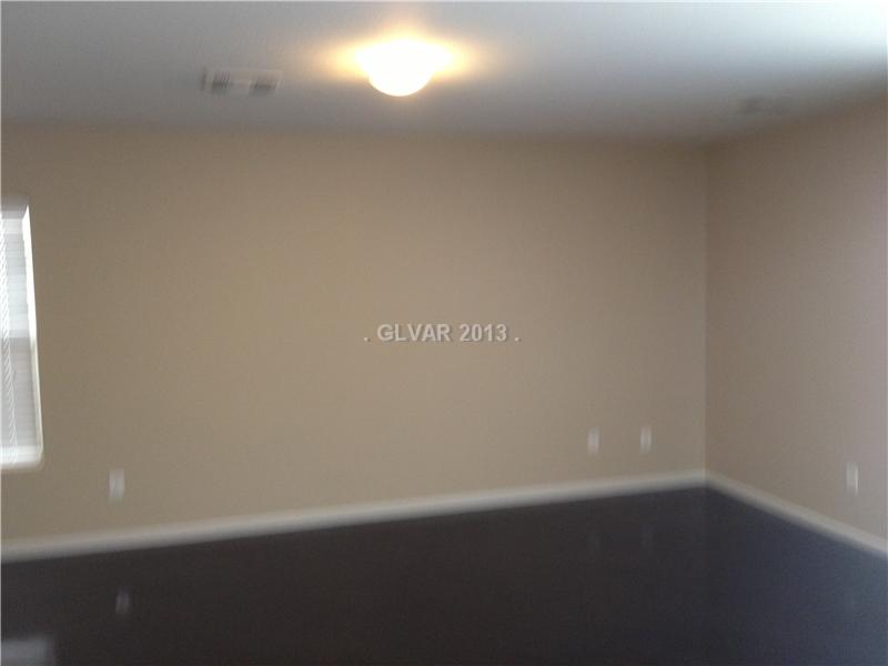 8305 Time Machine Avenue Las Vegas, NV 89113 - Photo 3 of 8 Living Room.