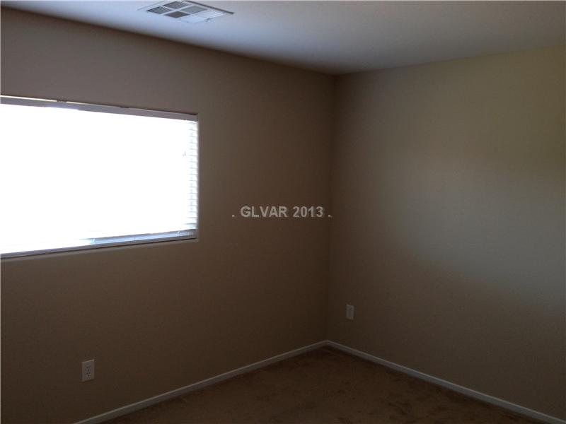 8305 Time Machine Avenue Las Vegas, NV 89113 - Photo 6 of 8 Master Bedroom.