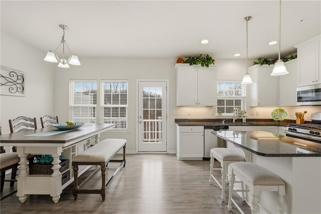 103 John Street Washington, PA 15301 - Photo 11 of 39 a kitchen with counter space dining table and chairs