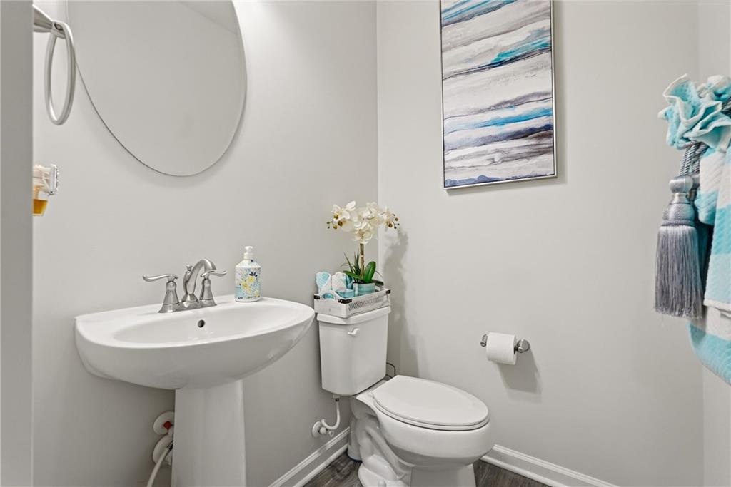 103 John Street Washington, PA 15301 - Photo 20 of 39 a bathroom with a sink toilet and a mirror