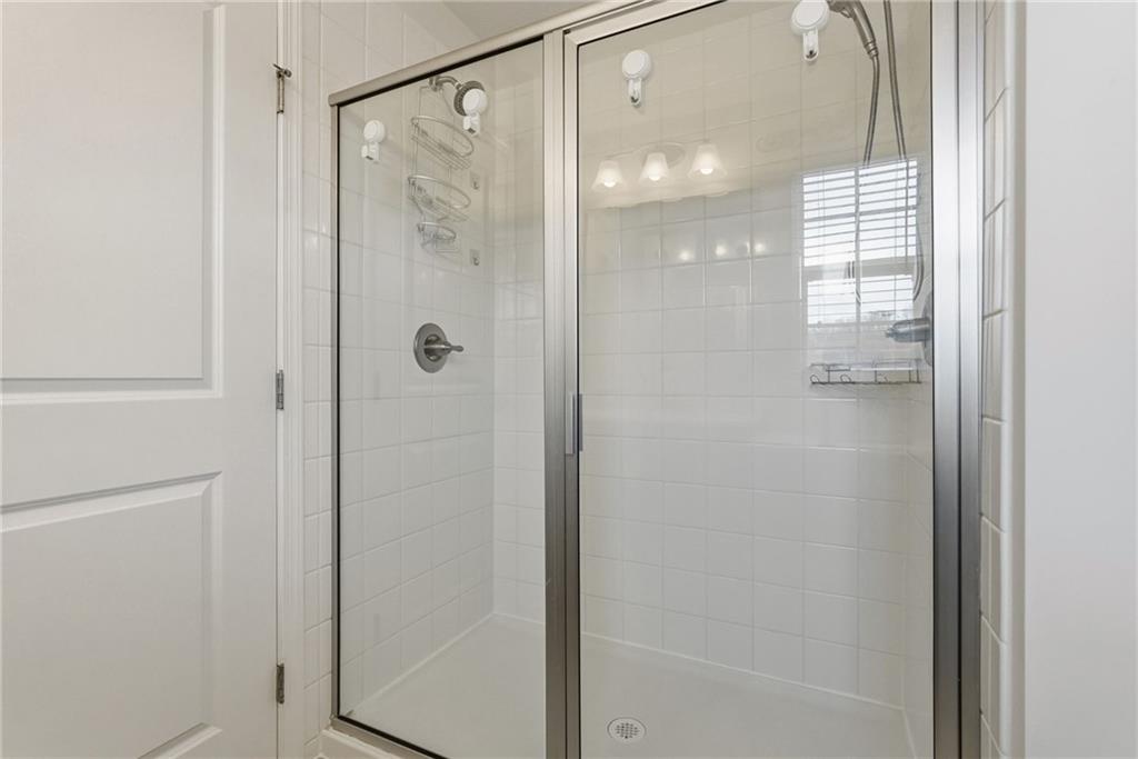 103 John Street Washington, PA 15301 - Photo 24 of 39 a bathroom with a glass shower door