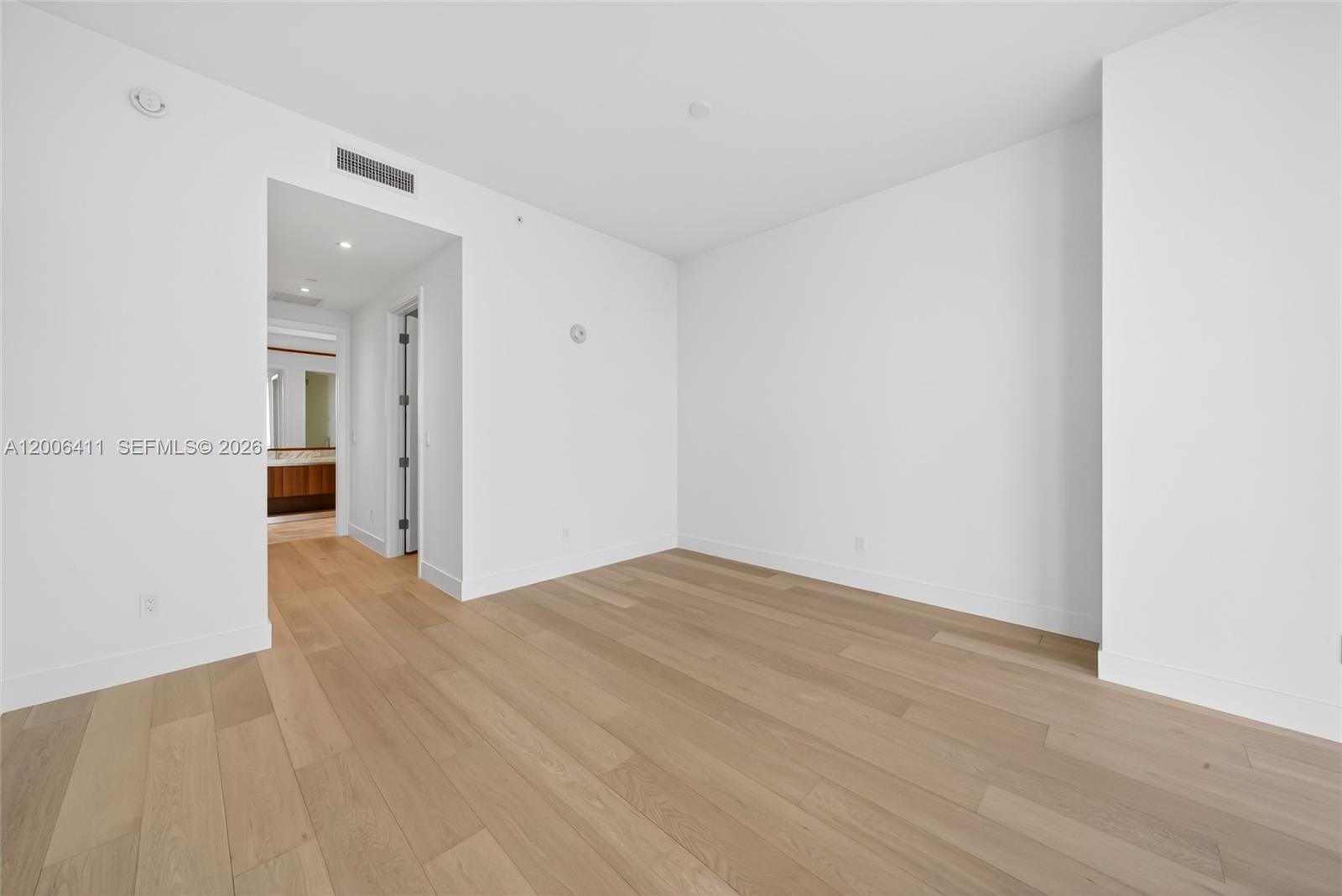 175 Southeast 25th Road, Unit 1202 Miami, FL 33129 - Photo 18 of 74 a view of an empty room with wooden floor