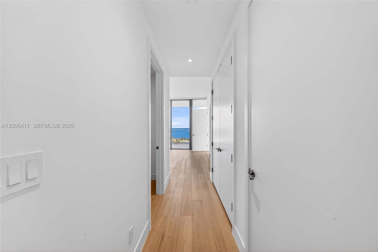175 Southeast 25th Road, Unit 1202 Miami, FL 33129 - Photo 24 of 74 a view of a hallway with wooden floor