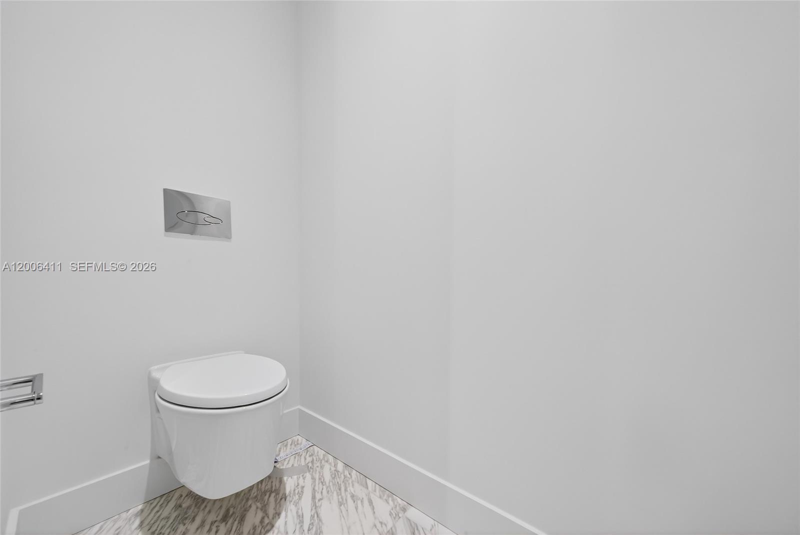 175 Southeast 25th Road, Unit 1202 Miami, FL 33129 - Photo 27 of 74 a bathroom with a toilet and a sink