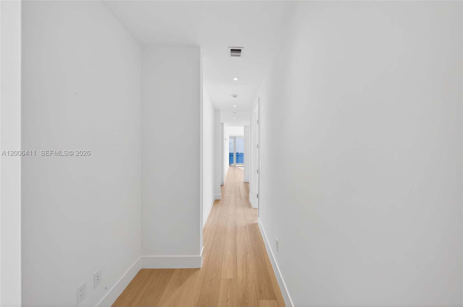 175 Southeast 25th Road, Unit 1202 Miami, FL 33129 - Photo 31 of 74 a view of a hallway with wooden floor