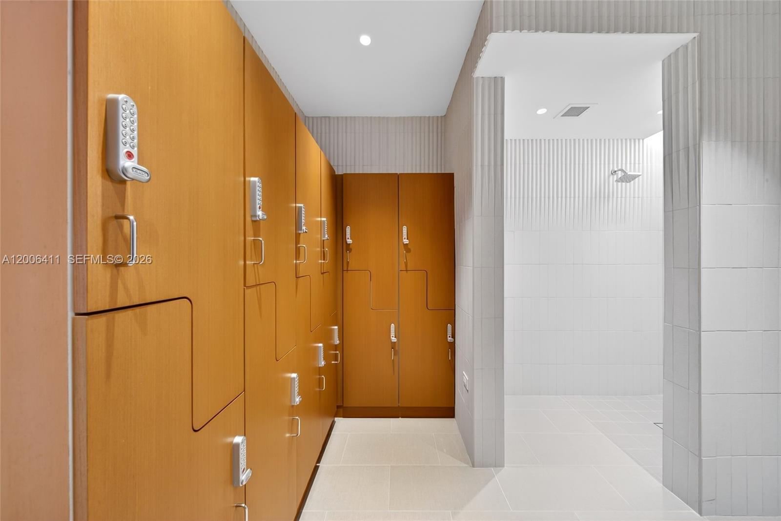 175 Southeast 25th Road, Unit 1202 Miami, FL 33129 - Photo 62 of 74 a bathroom with a shower and a glass door