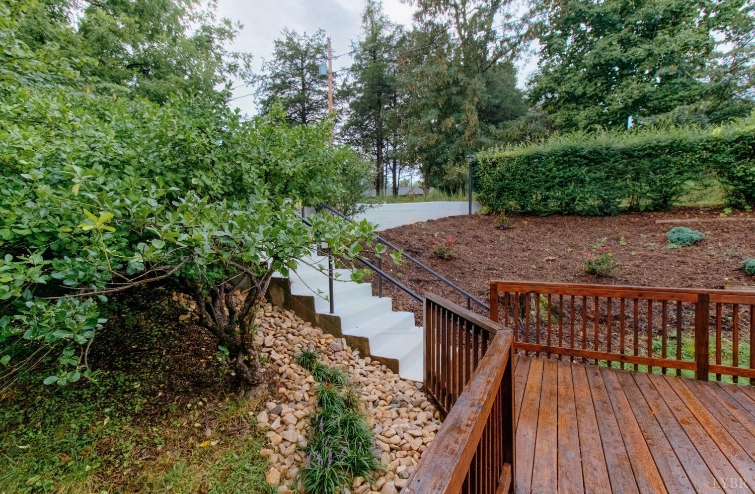 152 Hanger Road Amherst, VA 24521 - Photo 9 of 27 a balcony with wooden floor and fence