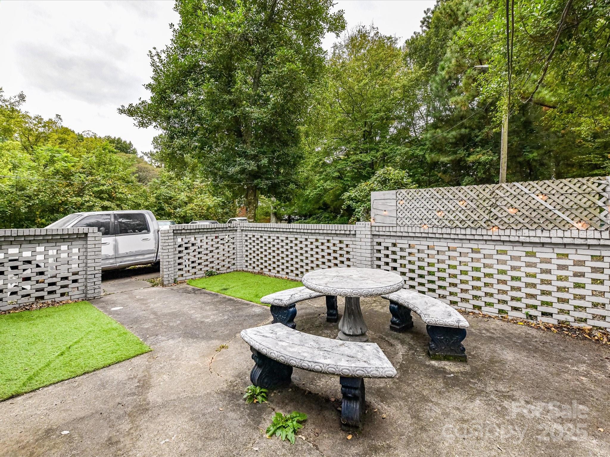 4500 Matthews-Mint Hill Road Matthews, NC 28105 - Photo 30 of 40 a view of a chairs and table in backyard