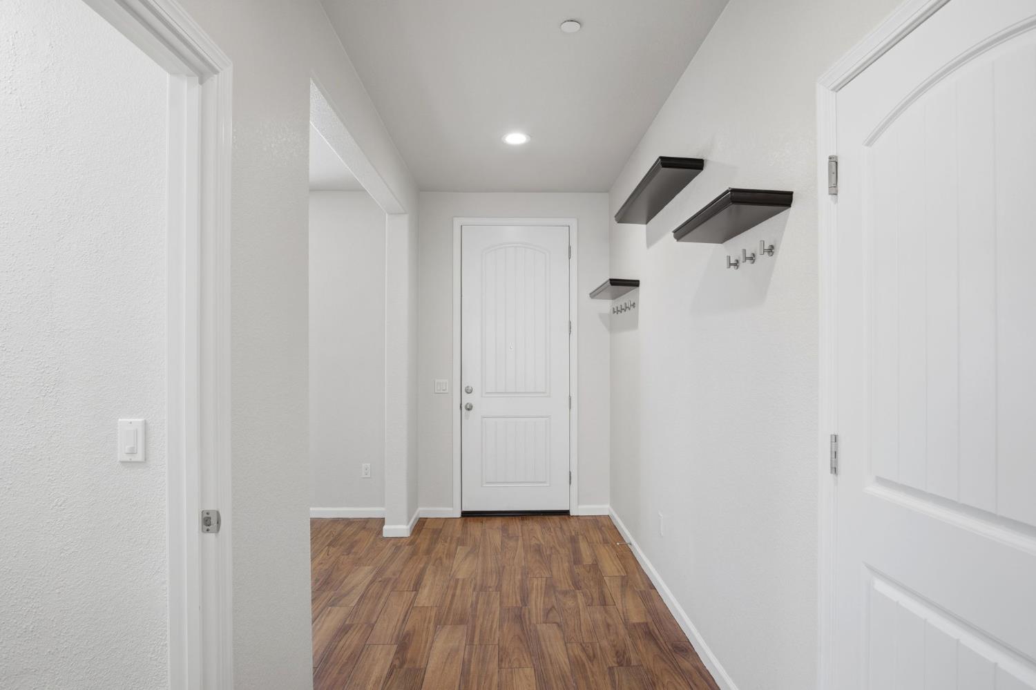 4113 Snowfire Drive Modesto, CA 95357 - Photo 8 of 19 a view of empty room with wooden floor