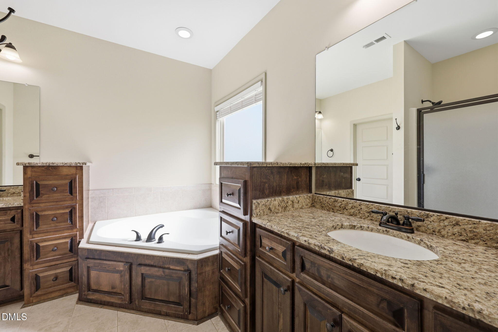 3587 Hannah Creek Road Benson, NC 27504 - Photo 18 of 43 a bathroom with a granite countertop sink and a mirror