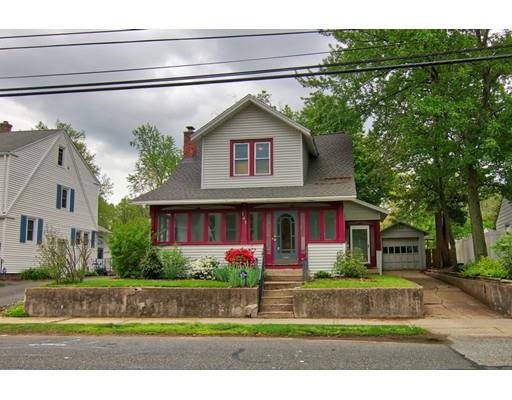141 Dwight Road Springfield, MA 01108 - Photo 1 of 12 a front view of a house with a yard
