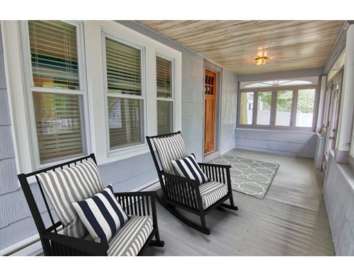 141 Dwight Road Springfield, MA 01108 - Photo 2 of 12 a view of porch with furniture and large windows