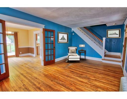 141 Dwight Road Springfield, MA 01108 - Photo 3 of 12 a view of a livingroom with furniture stairs and a living room