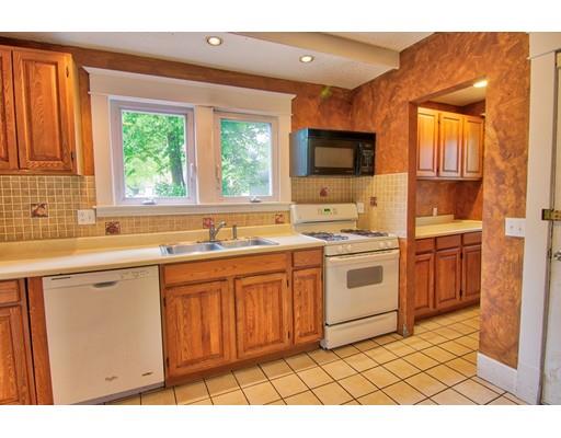 141 Dwight Road Springfield, MA 01108 - Photo 6 of 12 a kitchen with a sink cabinets and window