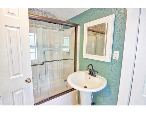 141 Dwight Road Springfield, MA 01108 - Photo 9 of 12 a bathroom with a sink and a mirror