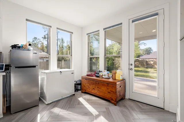 a living room with furniture and a window