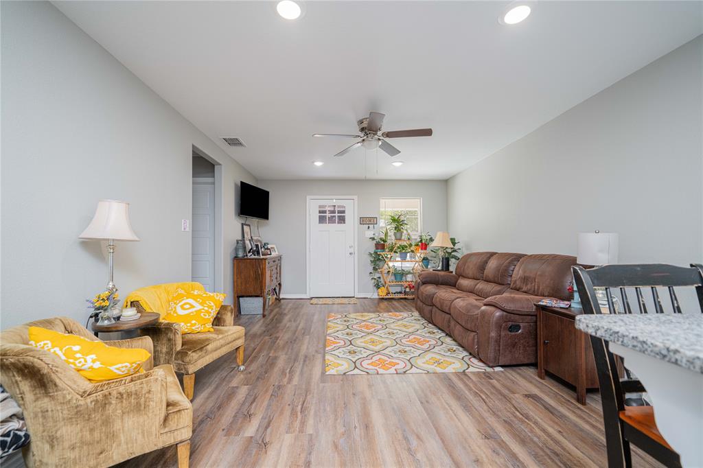 105 Francis Street Hawkins, TX 75765 - Photo 10 of 15 a living room with furniture and wooden floor