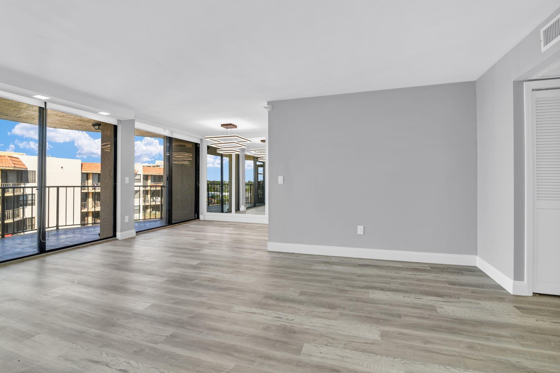 859 Jeffery Street, Unit 810 Boca Raton, FL 33487 - Photo 11 of 61 a view of an empty room with glass door