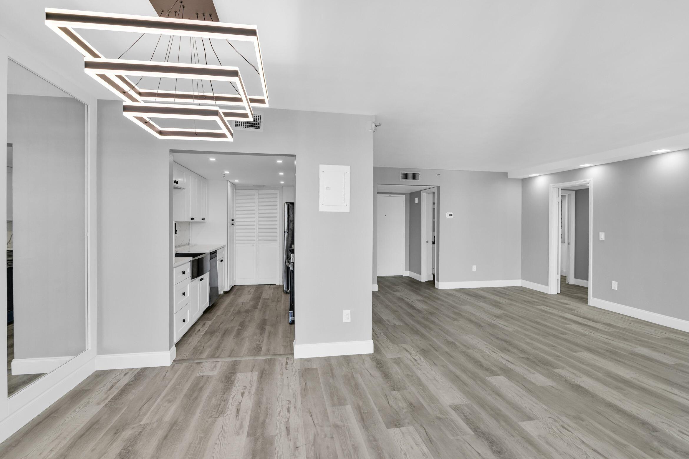 859 Jeffery Street, Unit 810 Boca Raton, FL 33487 - Photo 3 of 61 a view of empty room with wooden floor