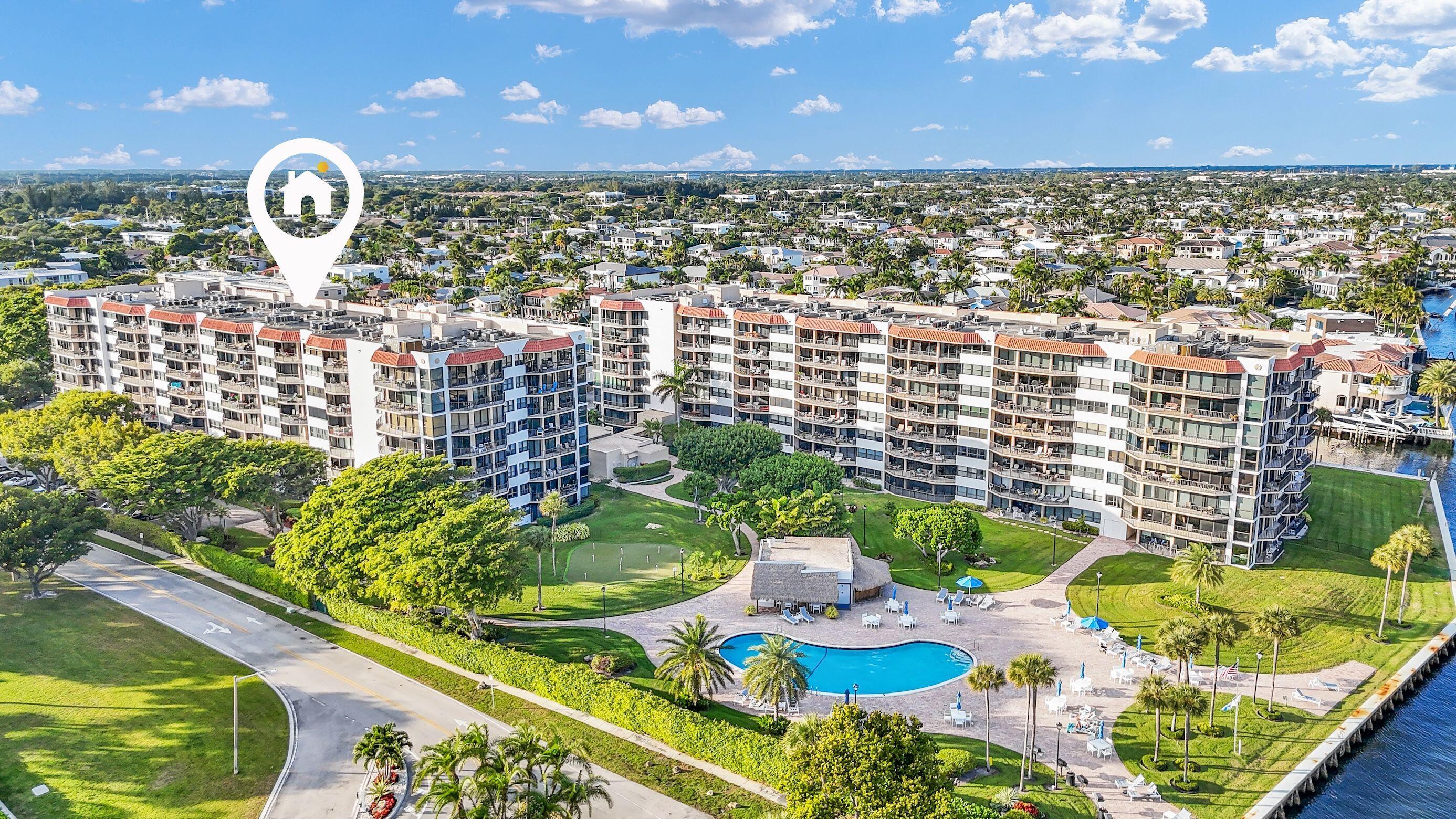 859 Jeffery Street, Unit 810 Boca Raton, FL 33487 - Photo 31 of 61 a view of a balcony with dining table and chairs