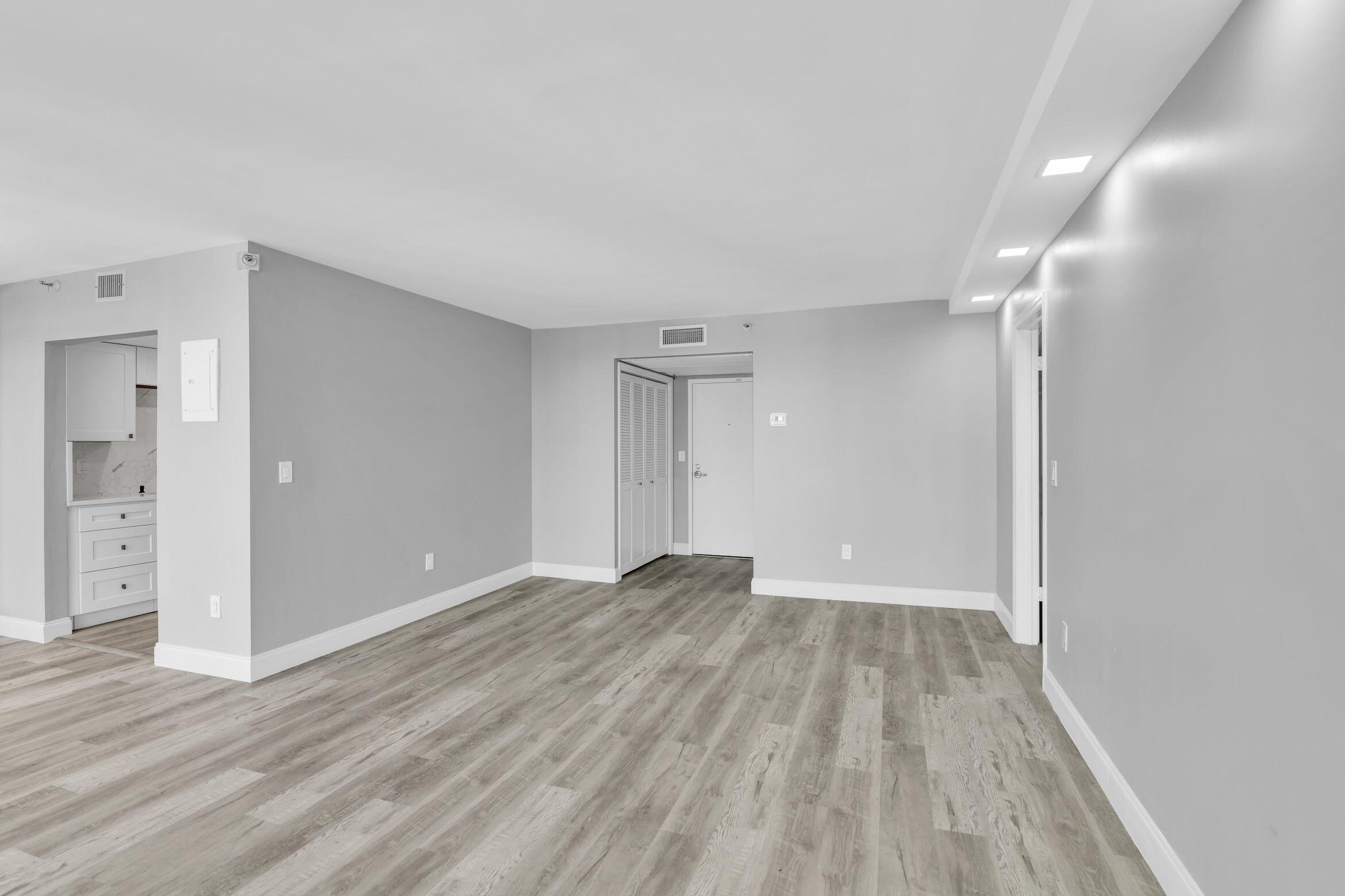 859 Jeffery Street, Unit 810 Boca Raton, FL 33487 - Photo 7 of 61 wooden floor in an empty room with a window