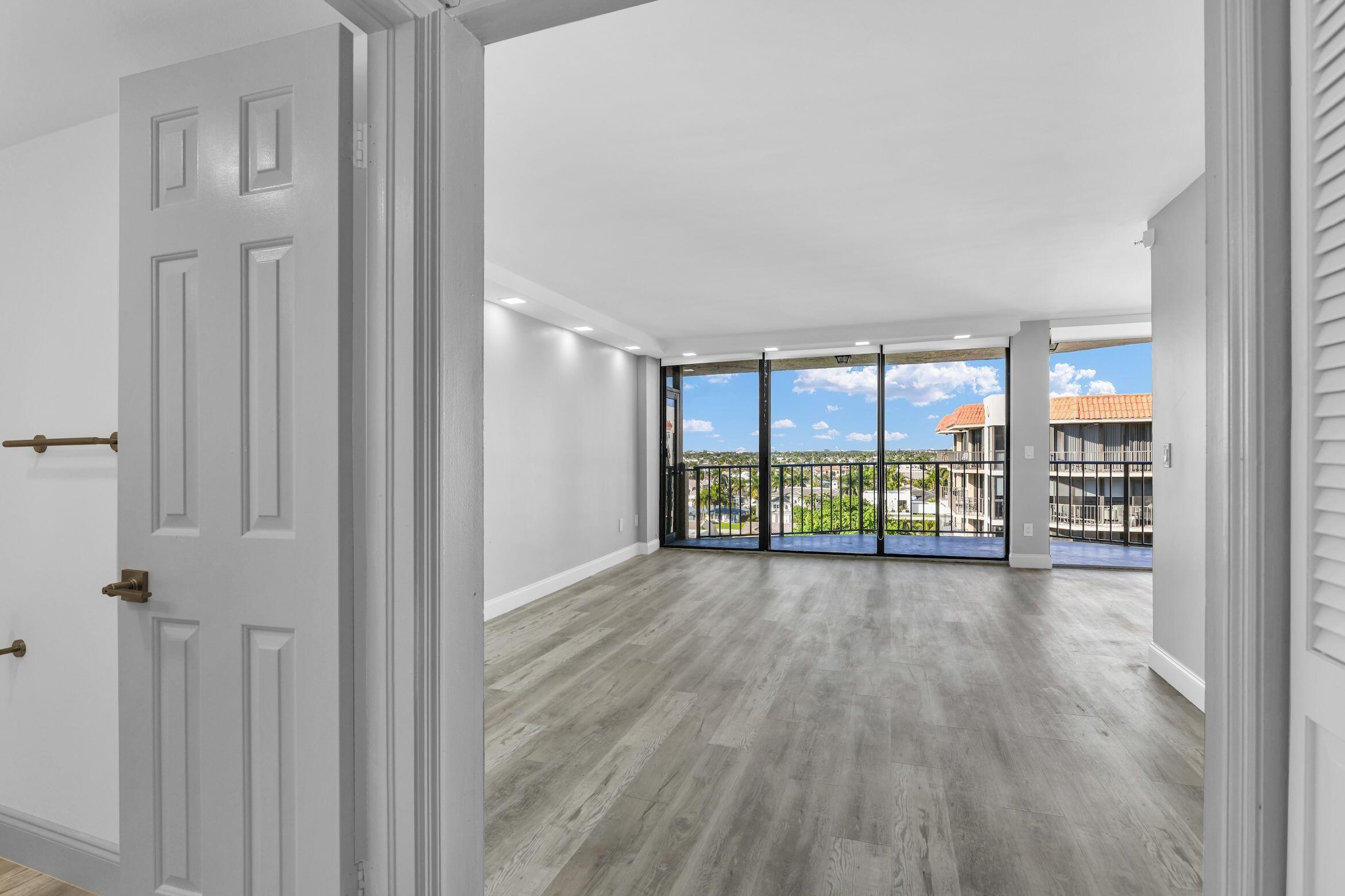 859 Jeffery Street, Unit 810 Boca Raton, FL 33487 - Photo 9 of 61 a view of a room with wooden floor