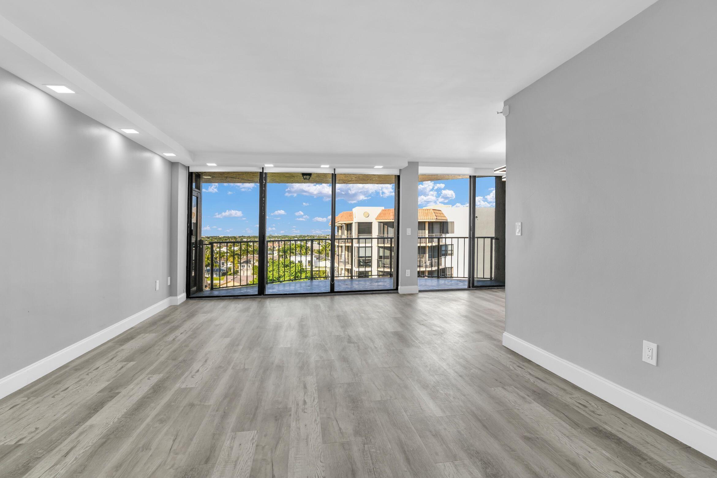 859 Jeffery Street, Unit 810 Boca Raton, FL 33487 - Photo 10 of 61 wooden floor in an empty room with a window